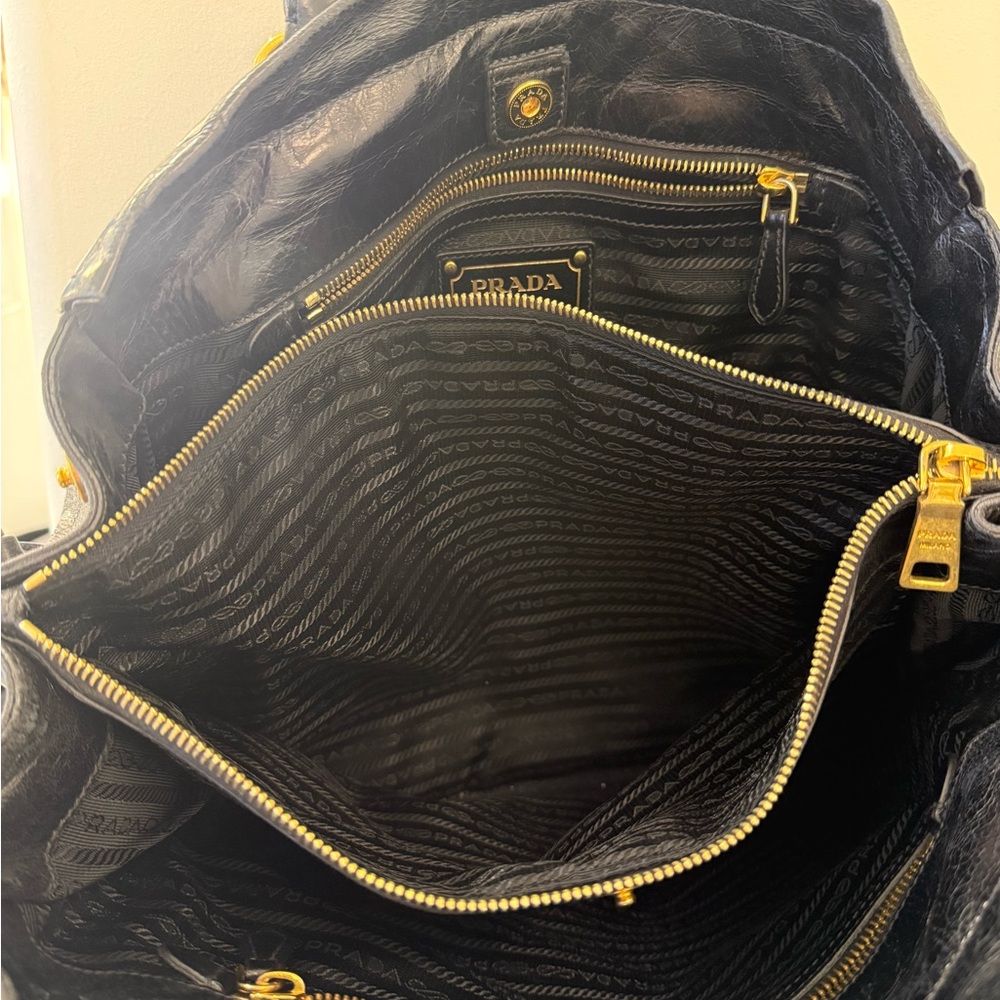 Prada Black Leather Handbag with Gold Accents - Picture 8 of 8